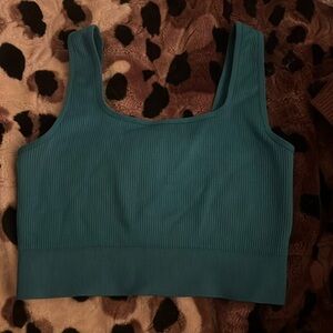 Teal crop top with cross backing
